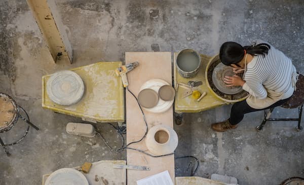Student Working In The Ceramics Studio In Reilly Hall From Above